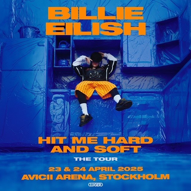 Billie Eilish på en scen med information om turnén pålagd.