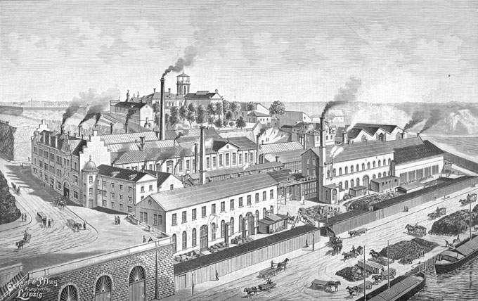 Industriellt stadslandskap i svart och vitt.