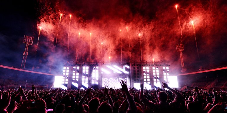 A large crowd in front of the main stage at Summerburst. Summerburst is an annual festival in Stockholm that focuses on electronic dance music. Some of the worlds biggest namns in dance music have performed at the festival.
