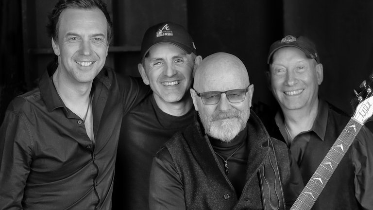 De fyra medlemmarna i Wishbone Ash.